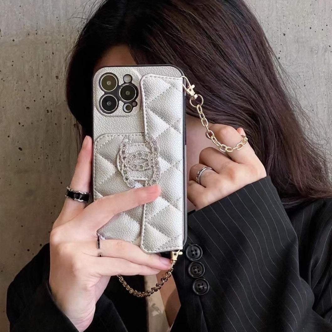 Custodia in pelle con motivo a carte per iPhone