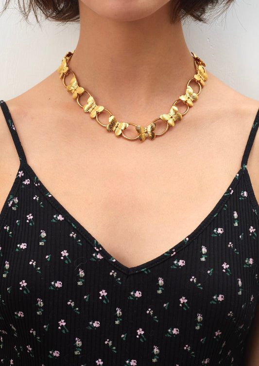 Riesige goldene Mottenkette