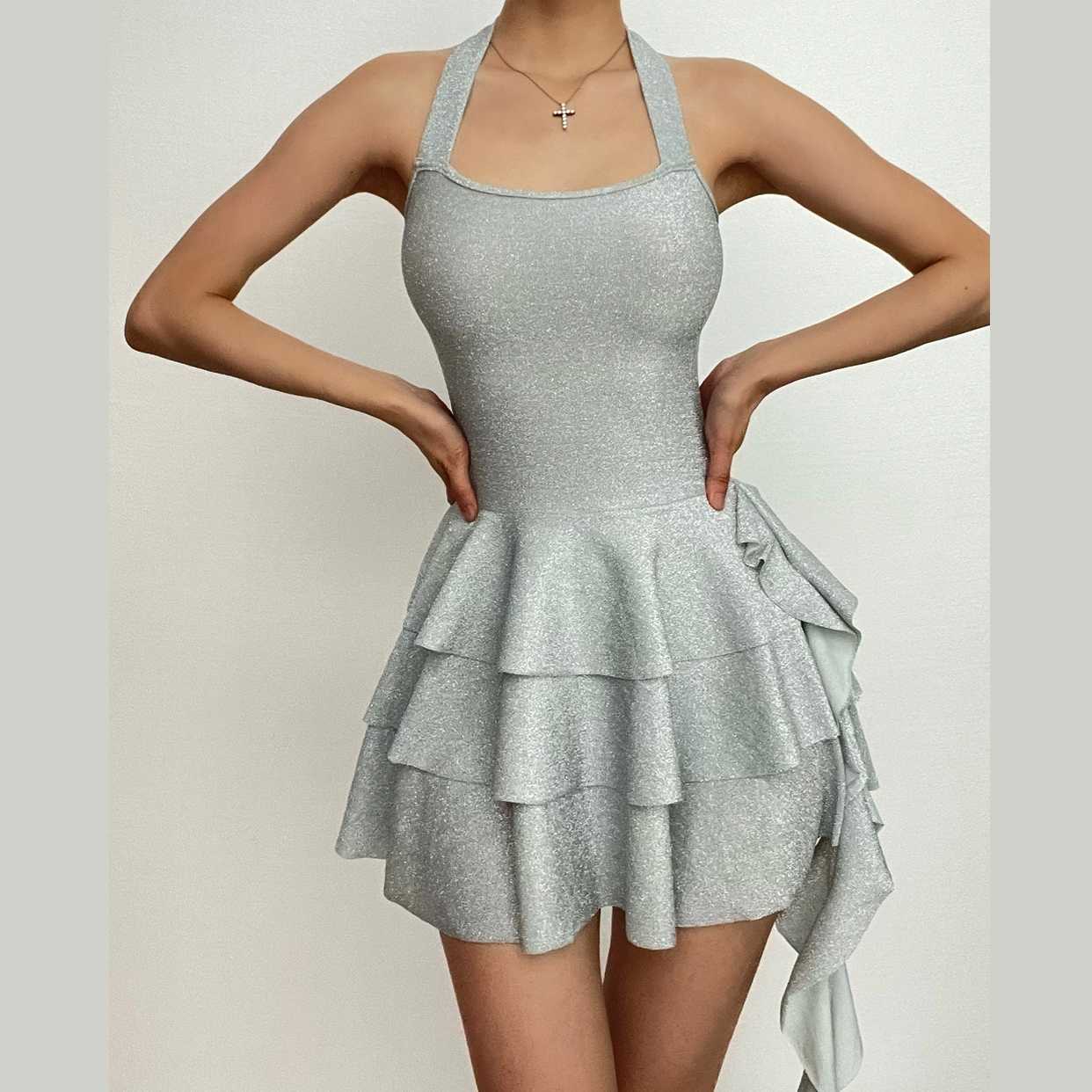 Solid halter textured pleated self tie backless mini dress