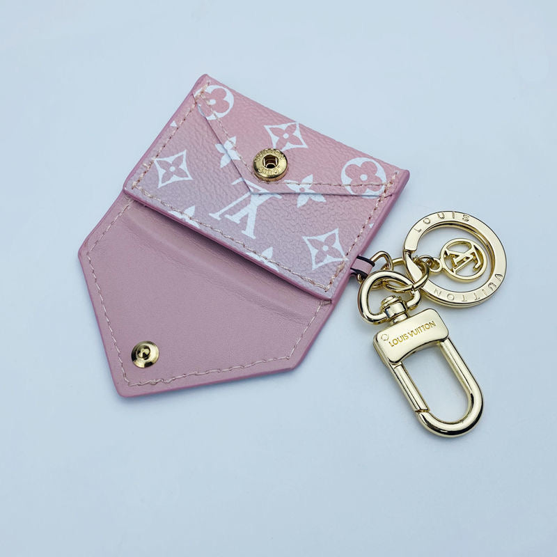 Schlüsselanhänger mit rosa Mädchen-Anhänger