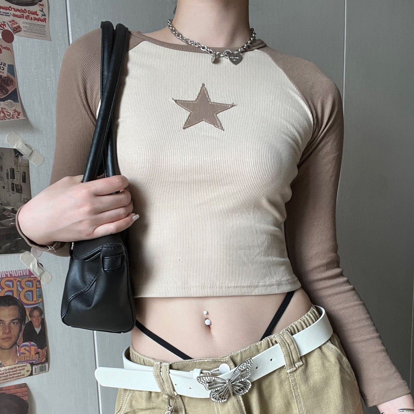 Maglia a maniche lunghe con scollo rotondo e coste a contrasto con patchwork di stelle