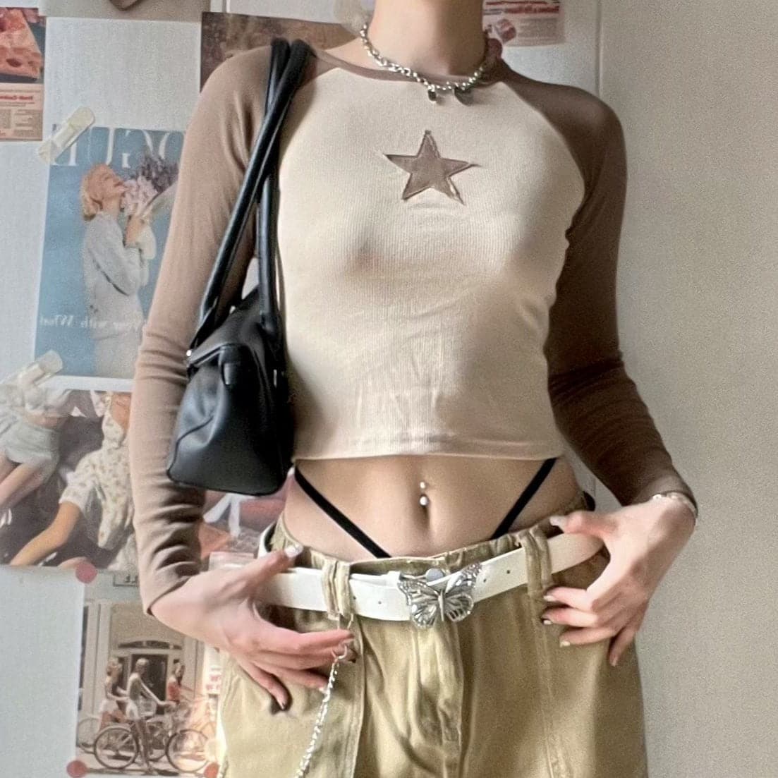 Maglia a maniche lunghe con scollo rotondo e coste a contrasto con patchwork di stelle