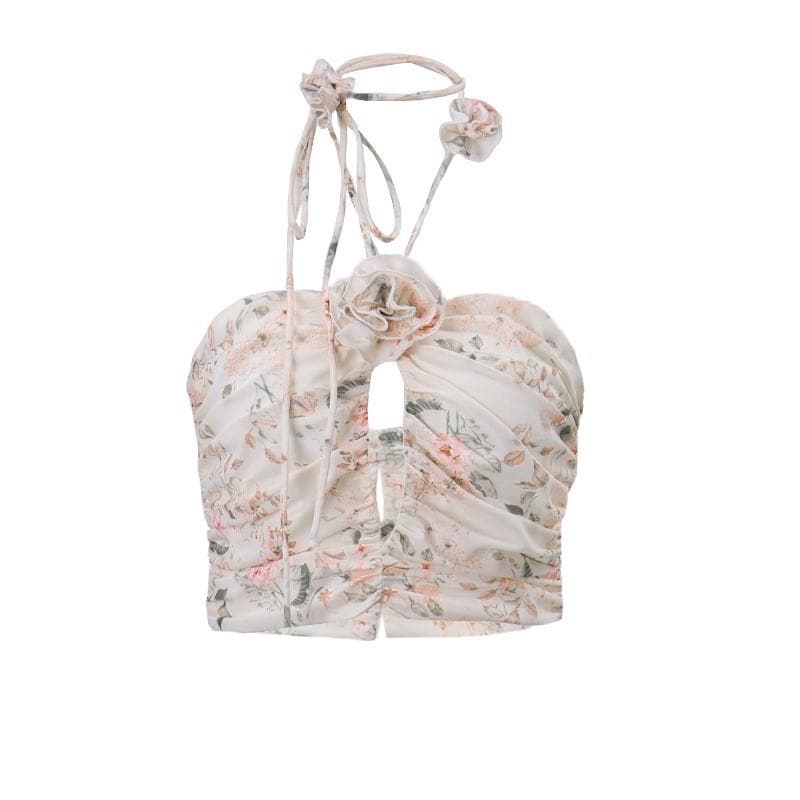 Top corto con schiena scoperta, scollo all'americana, bottoni traforati a contrasto e stampa floreale arricciata