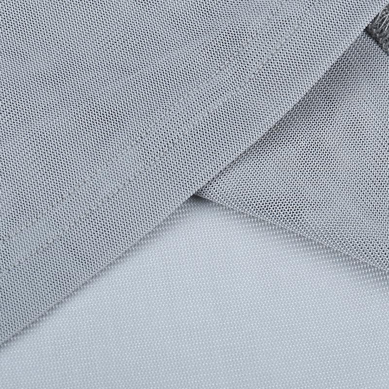 Top in rete trasparente con spacchi arricciati, maniche lunghe e perline