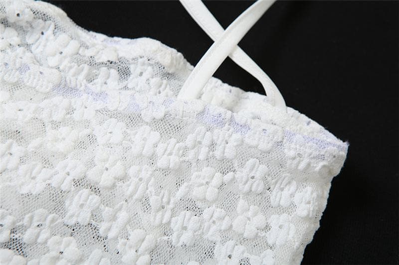 Top senza maniche con schiena scoperta e applicazioni di fiori in pizzo