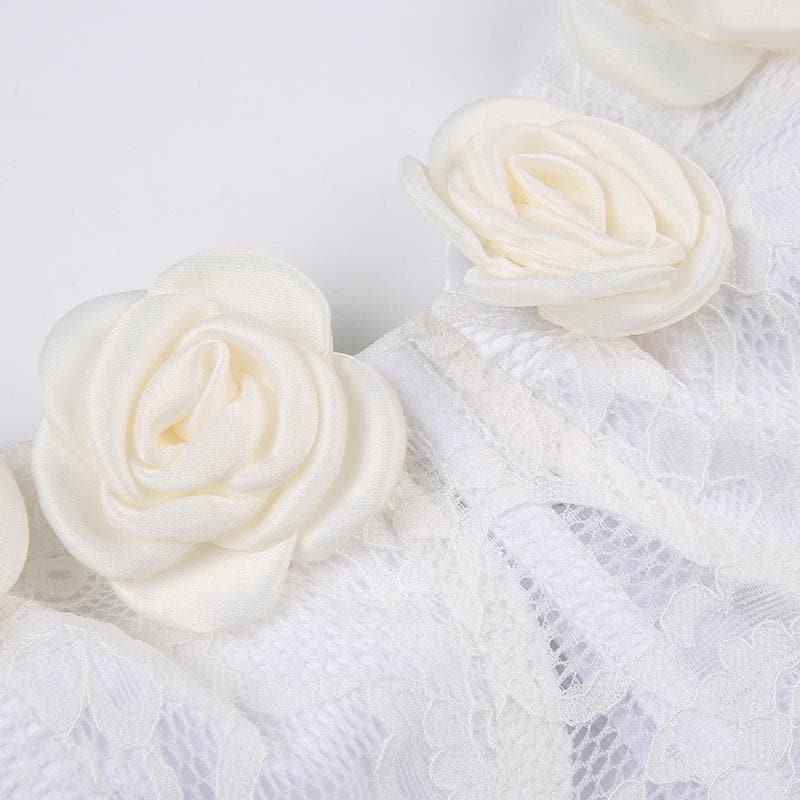Top a tubino senza schienale con applicazioni di fiori in pizzo e bottoni patchwork