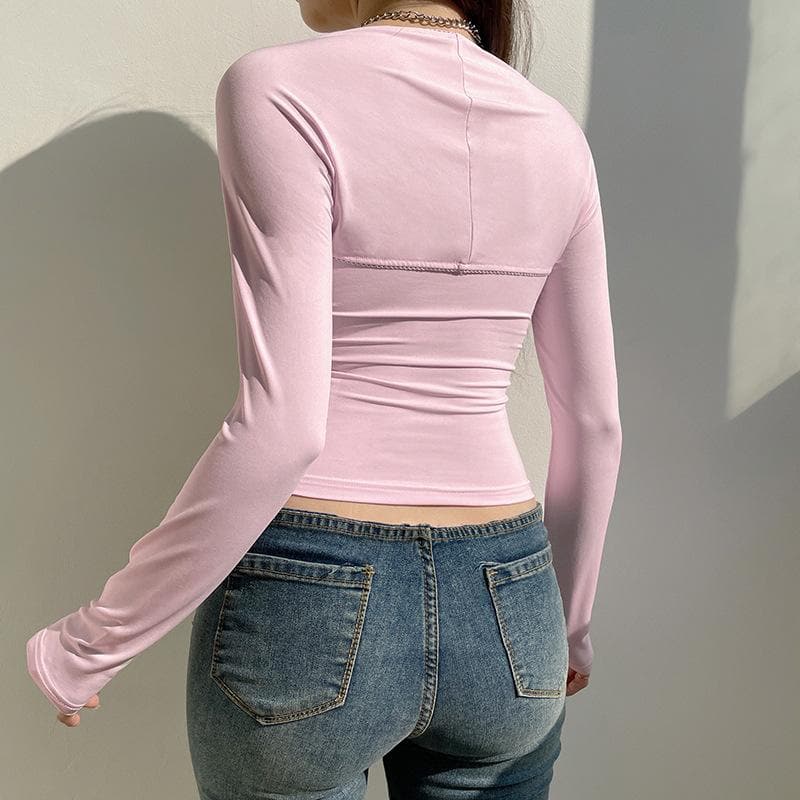 Top a tubino con scollo a V, maniche lunghe e orlo in pizzo arricciato, due pezzi