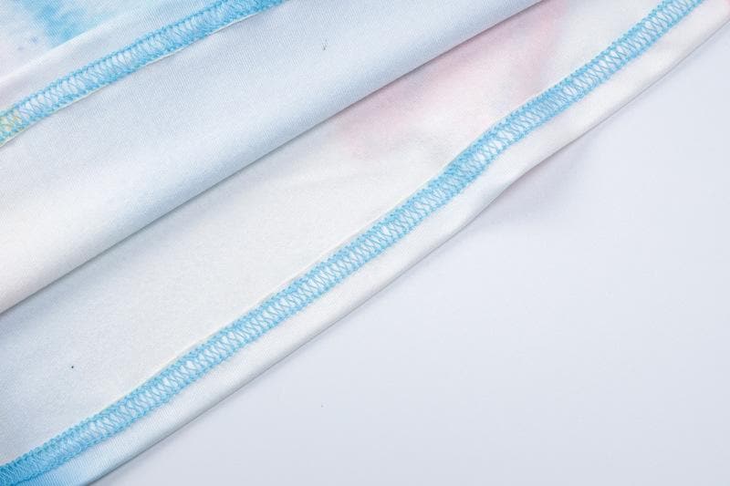 Top a maniche lunghe con stampa floreale a contrasto e scollo rotondo