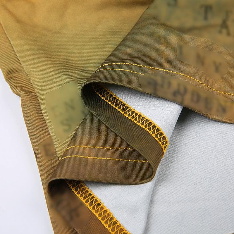 Top corto con spalline sottili e schiena scoperta con stampa a contrasto