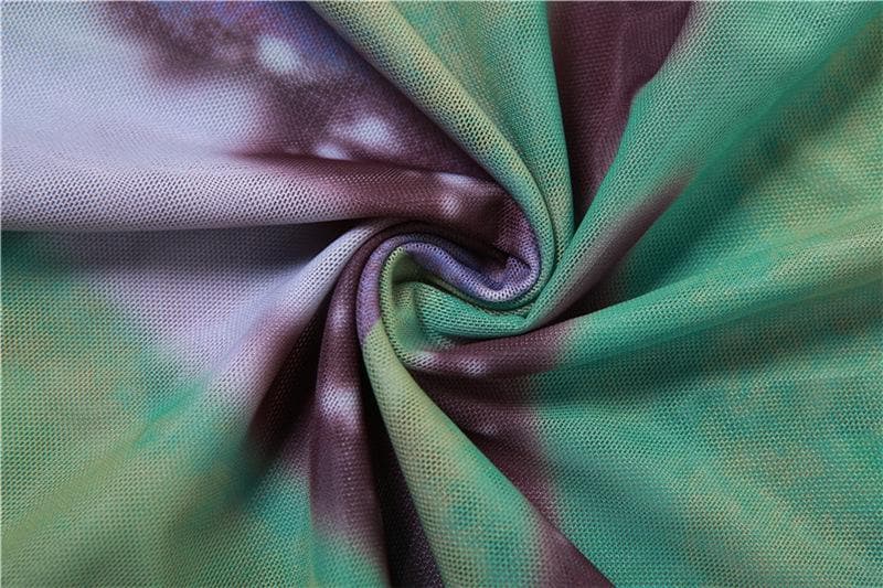 Neckholder-Maxikleid mit selbstbindendem Kontrastdruck und transparentem Netzstoff, rückenfrei und mit Aussparungen