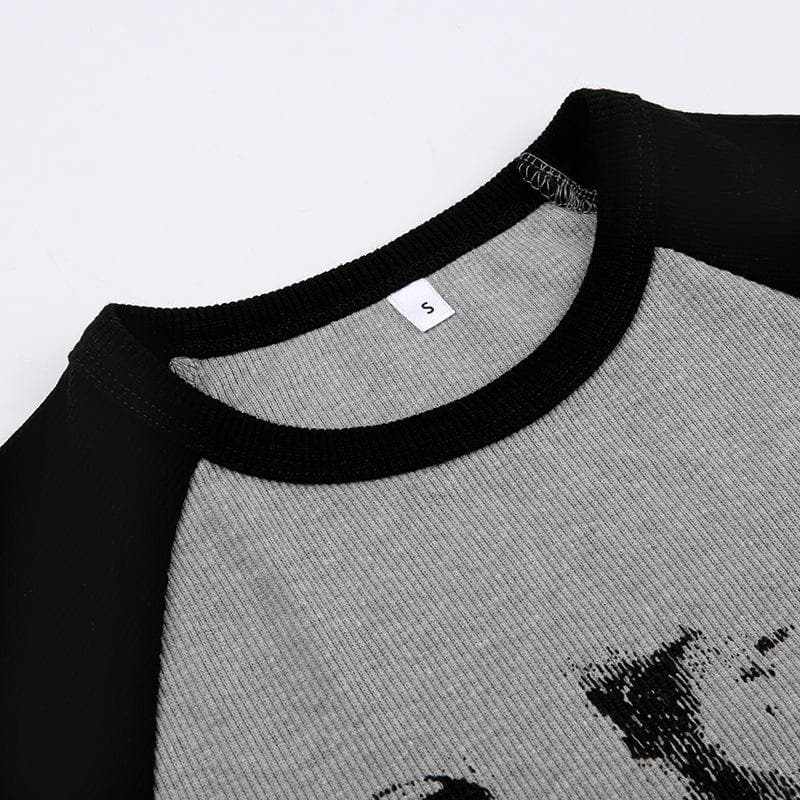 Top a maniche corte con scollo rotondo e stampa patchwork astratta a coste