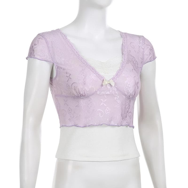 Top corto con volant e maniche a cappuccio in patchwork di pizzo a contrasto