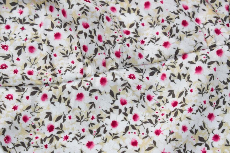 Top corto con stampa floreale, scollo quadrato, schiena scoperta e lacci