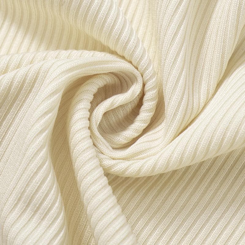 Ribbed flared sleeve heart applique ruffle v neck crop top