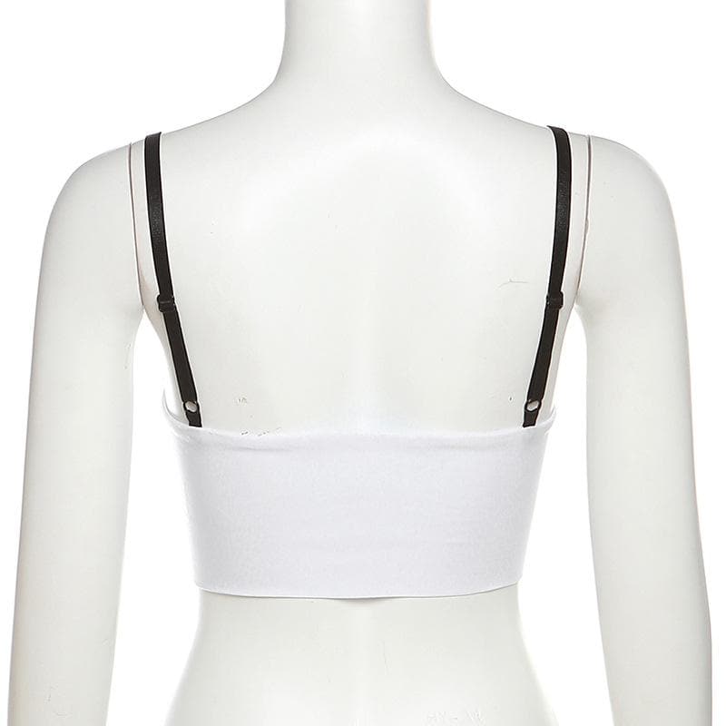 Top corto con scollatura profonda e schiena scoperta in pizzo patchwork a contrasto