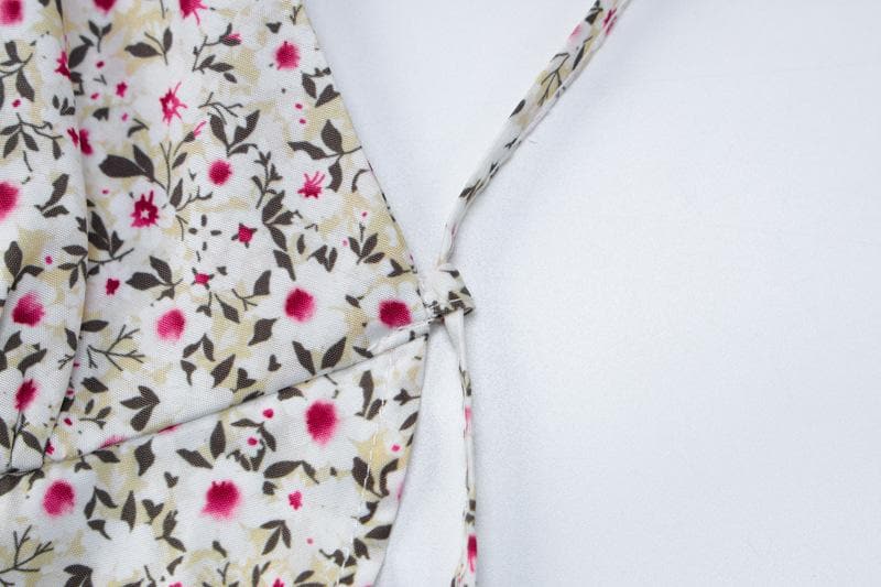 Top corto con stampa floreale, scollo quadrato, schiena scoperta e lacci