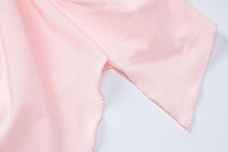 Top a maniche lunghe irregolari con scollo rotondo e arricciature