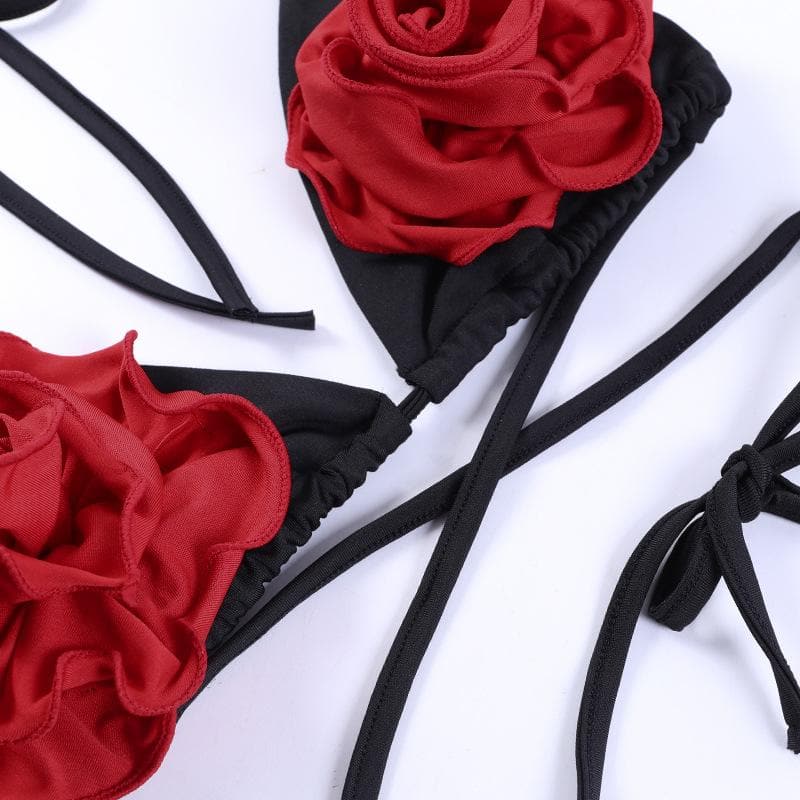 Neckholder-Hosenset zum Selbstbinden mit kontrastierender Blumenapplikation und überkreuztem Rücken