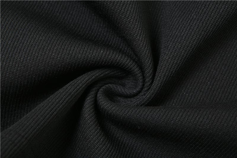 Top corto con scollo a U, schiena scoperta, catena in metallo e perline a stella