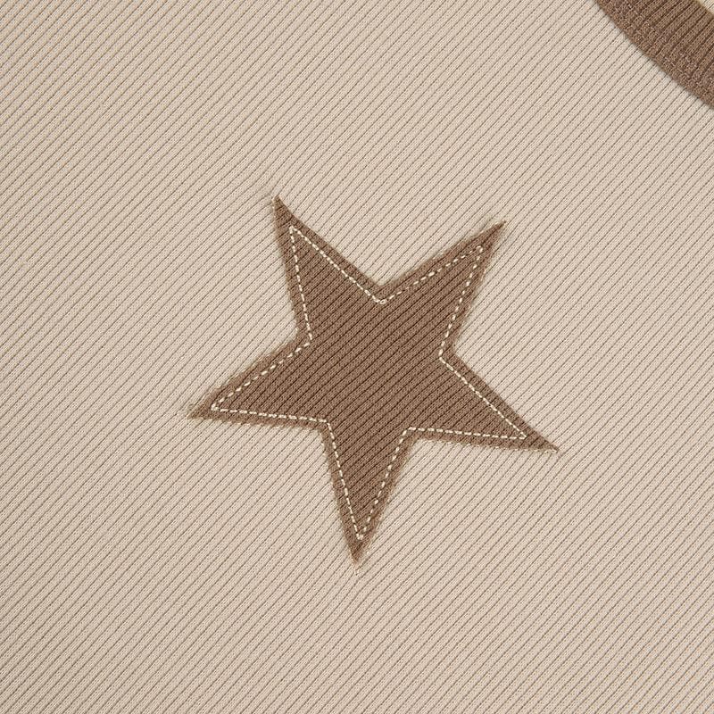 Maglia a maniche lunghe con scollo rotondo e coste a contrasto con patchwork di stelle
