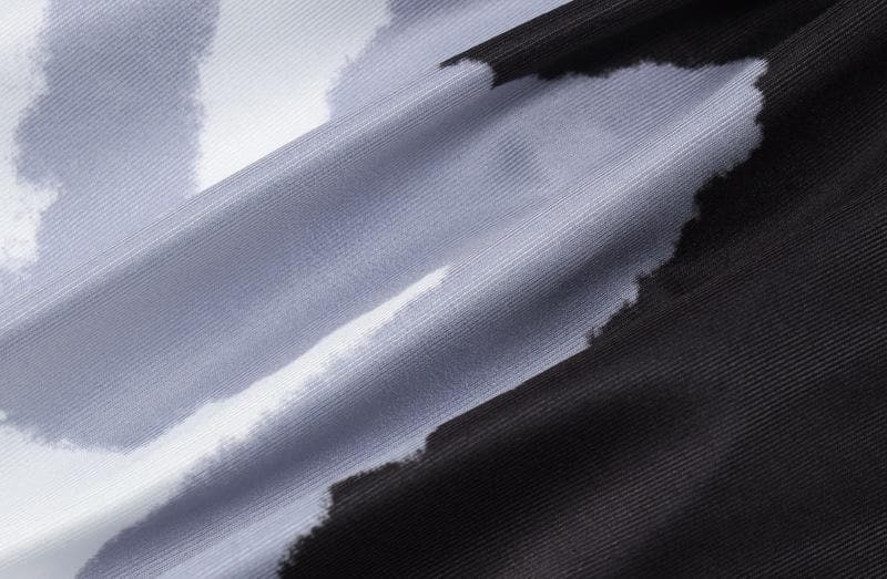 Tuta senza maniche con stampa a contrasto e scollo tondo sulla schiena