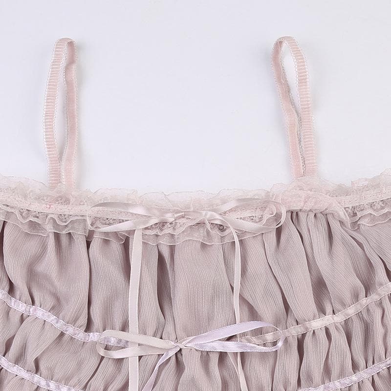 Top corto in chiffon con volant plissettato e orlo in pizzo con bottoni