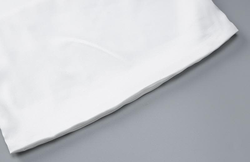 Top corto con scollo a cappuccio, senza spalline, senza schienale e allacciatura a vita bassa
