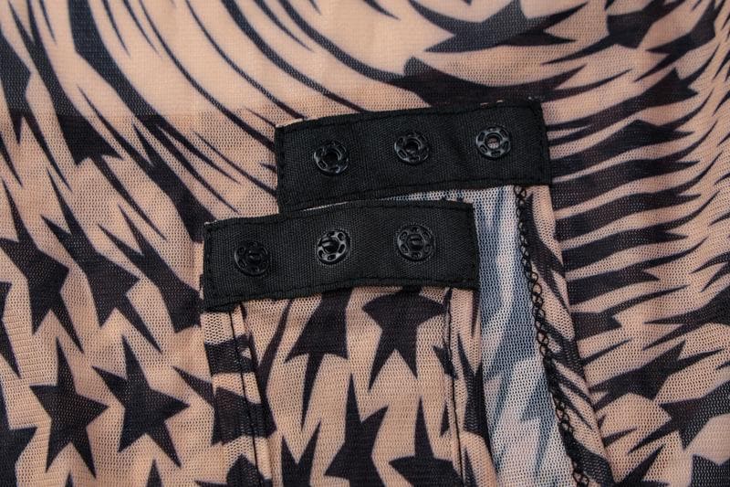 Durchsichtiges Bodysuit-Hosenset aus transparentem Netzstoff mit hohem Halsausschnitt und ärmellosem Sternmuster