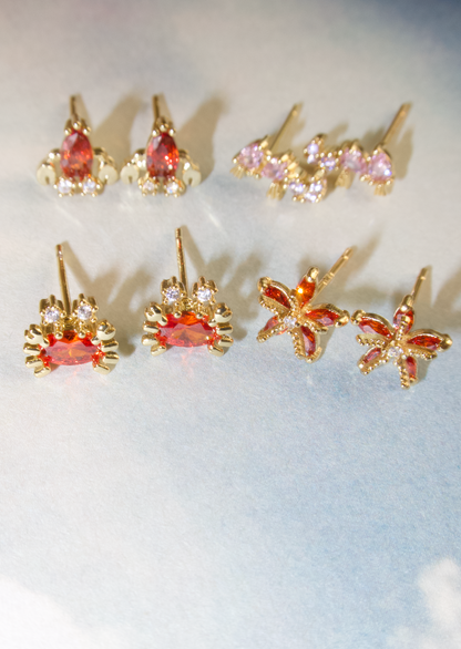 Glitzernde Ohrstecker „Petit Pink“ mit Seepferdchen