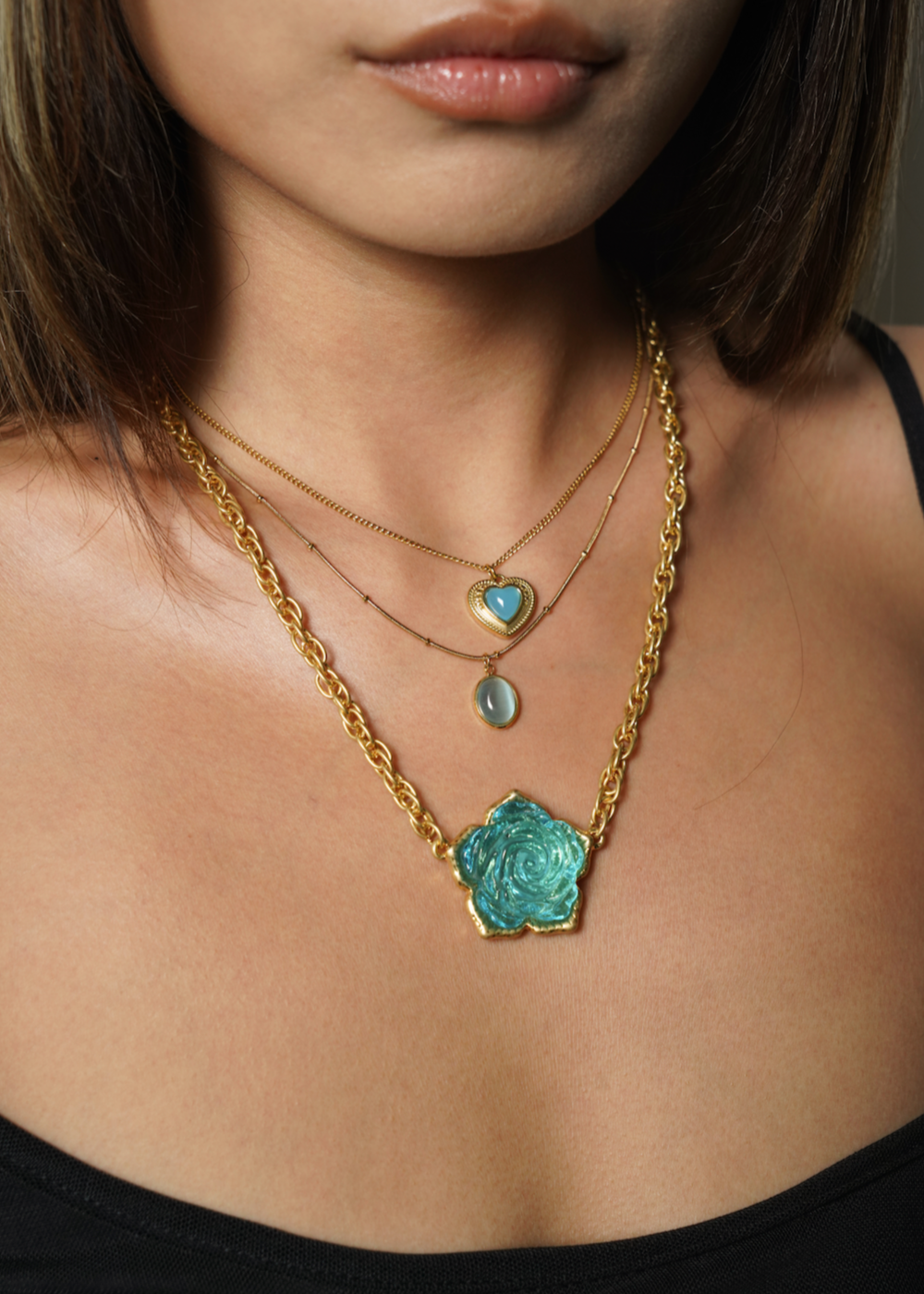 Collana dorata con cuore blu di Augusto