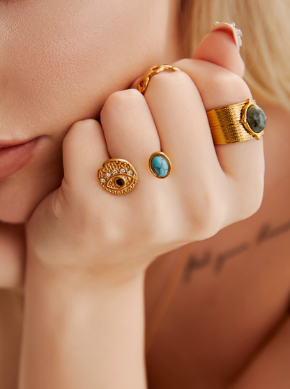 Anello dorato con pietra turchese "Occhio di Todd Wisdom"