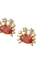 Glitzernde Ohrstecker „Petit Orange“ mit Krabbenmotiv