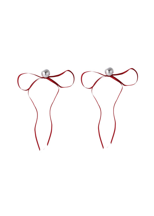 Orecchini lunghi con fiocco rosso