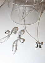 Marcel Glitzernde Schleifenohrringe