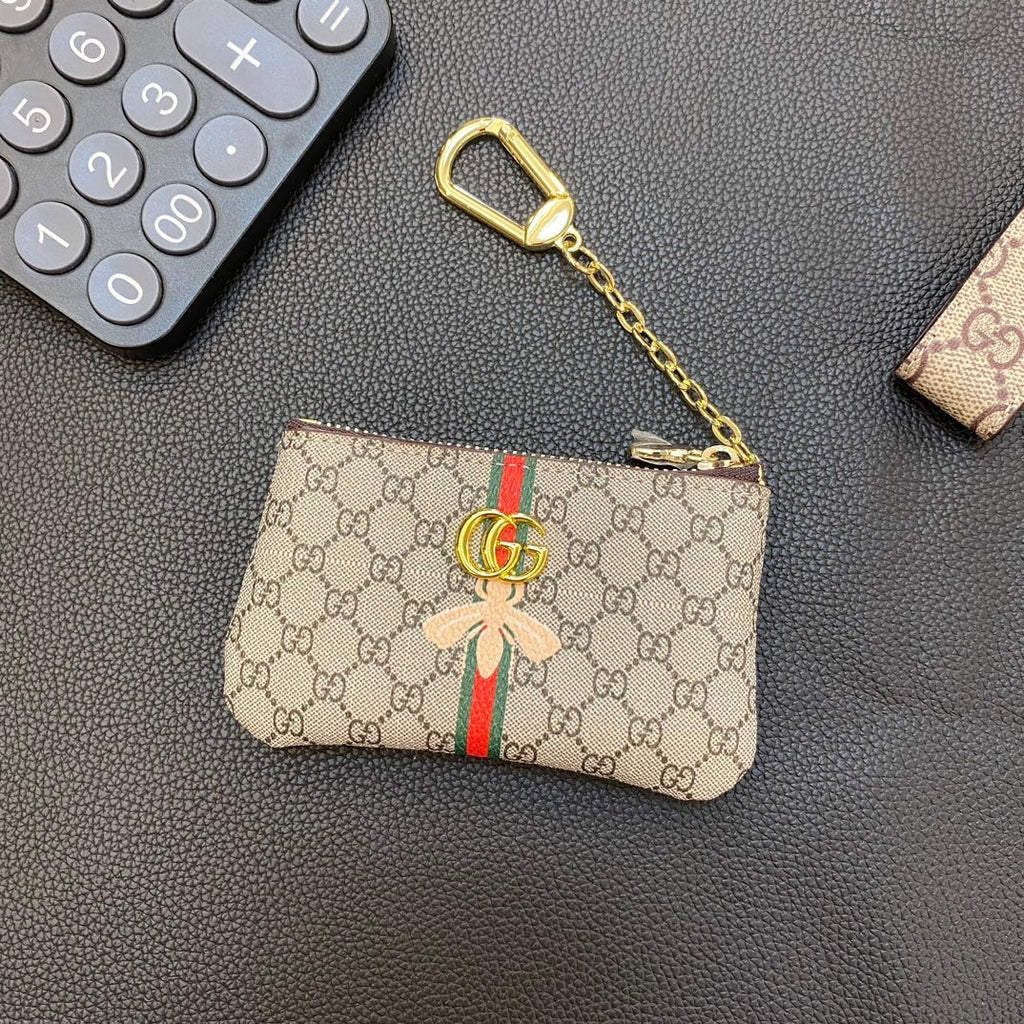 Graue Münzbörse mit Kette