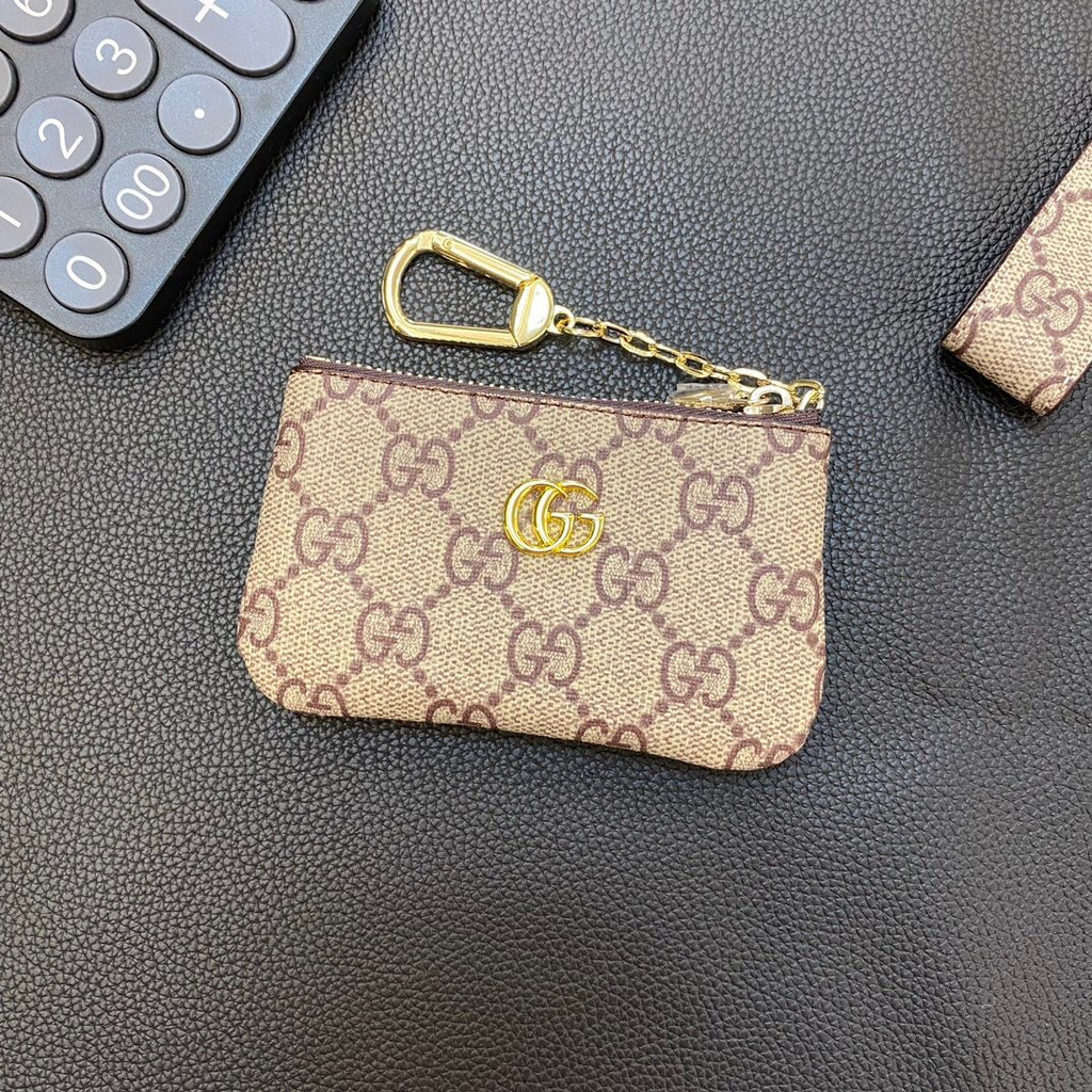 Graue Münzbörse mit Kette