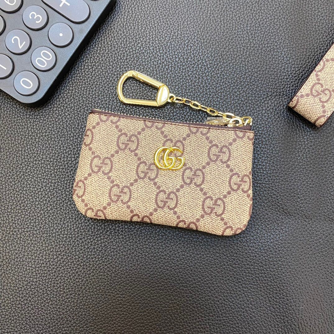 Graue Münzbörse mit Kette