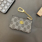 Graue Münzbörse mit Kette