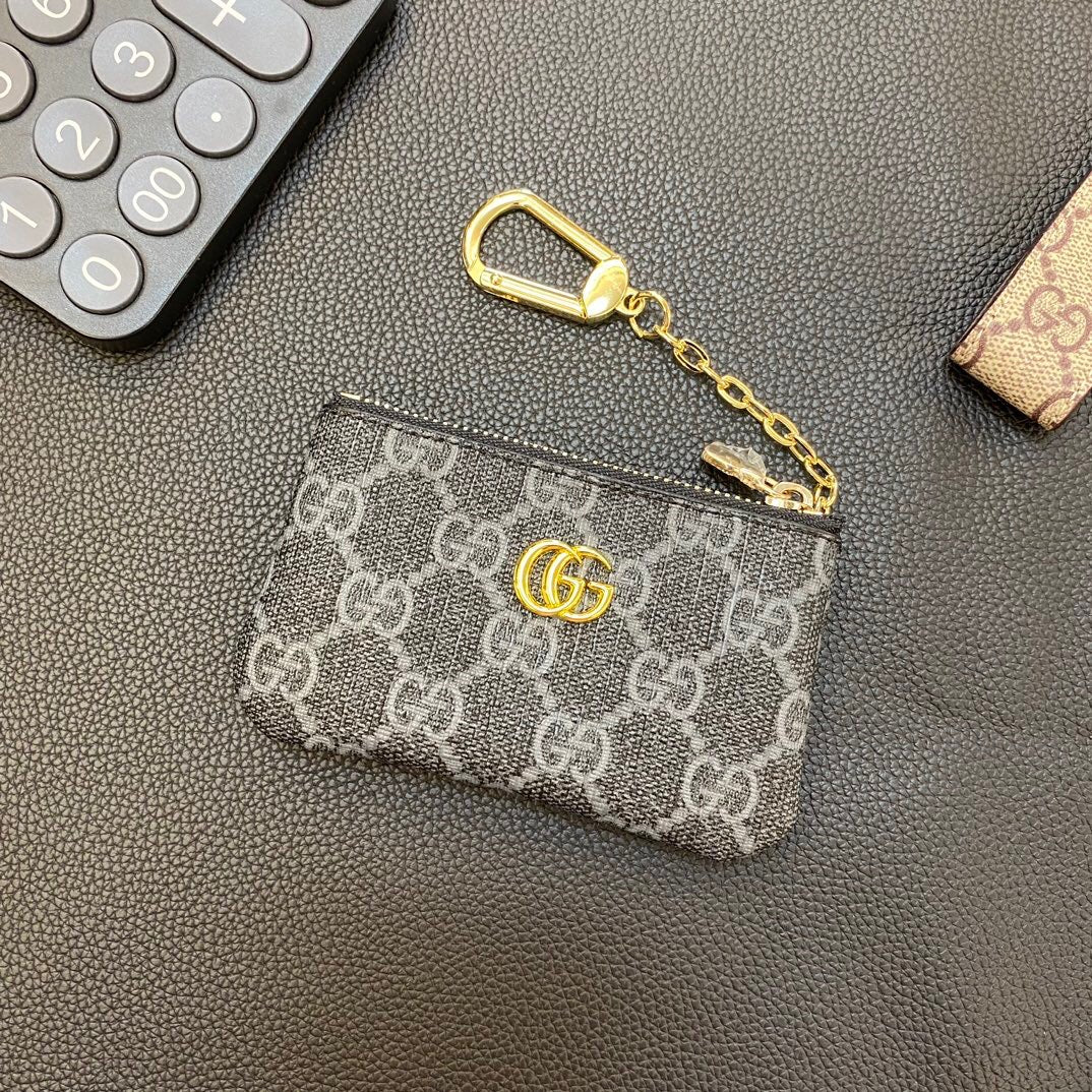 Graue Münzbörse mit Kette