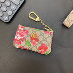 Graue Münzbörse mit Kette