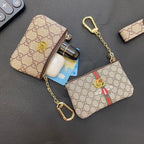 Graue Münzbörse mit Kette