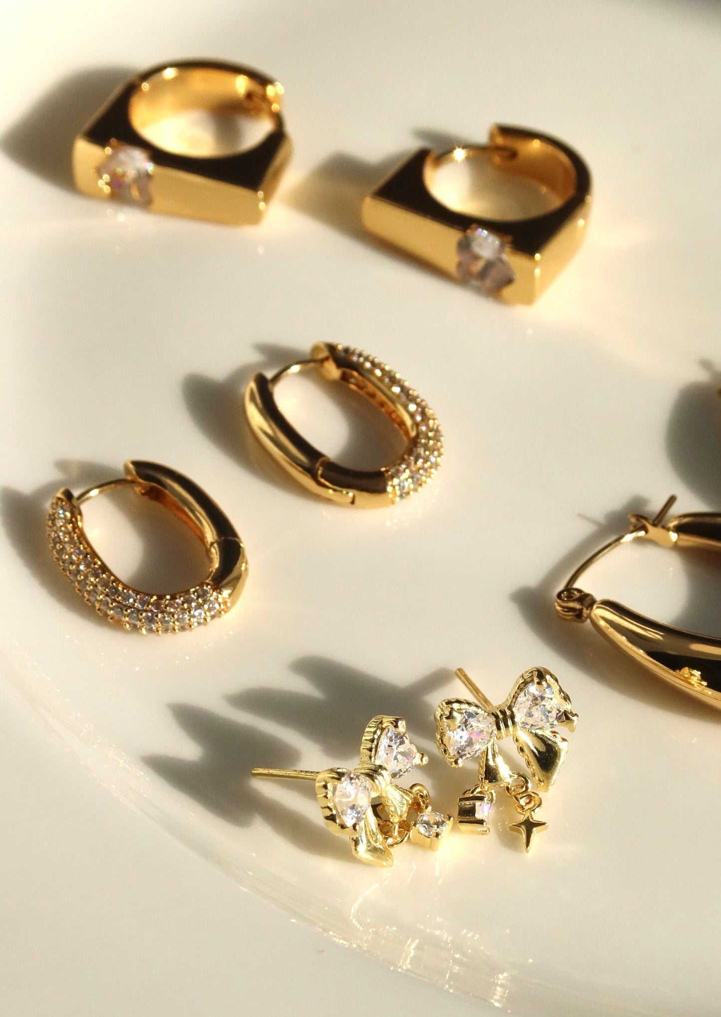 Diamant Leona Huggie Creolen Gold
