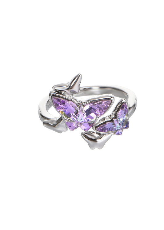 Anello regolabile in argento con farfalla viola in cristallo