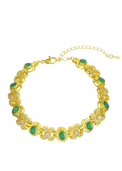 Bracciale dorato con pietre preziose verdi scintillanti Serena