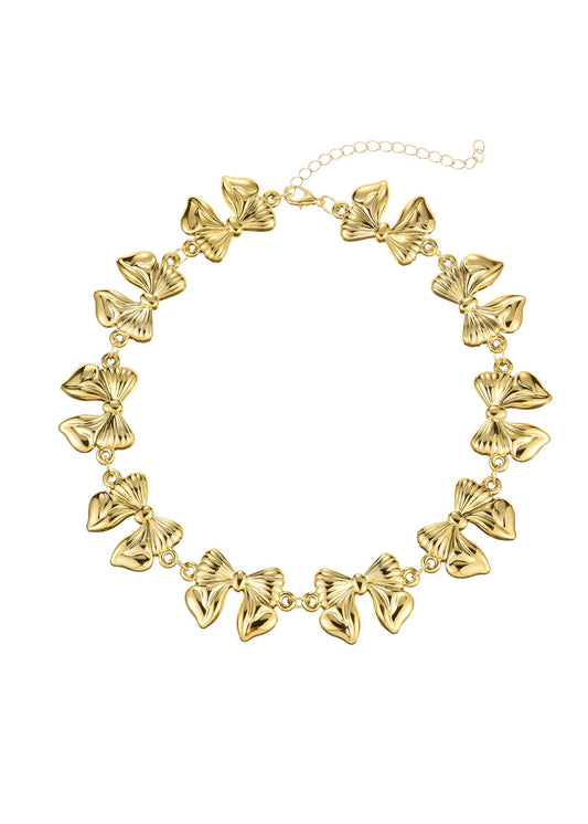 Cleo – Goldene Choker-Halskette mit riesiger Schleife