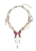Collana in argento con farfalla viola della giungla e motivo grunge