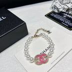 Braccialetto di perle in smalto rosa
