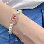 Braccialetto di perle in smalto rosa
