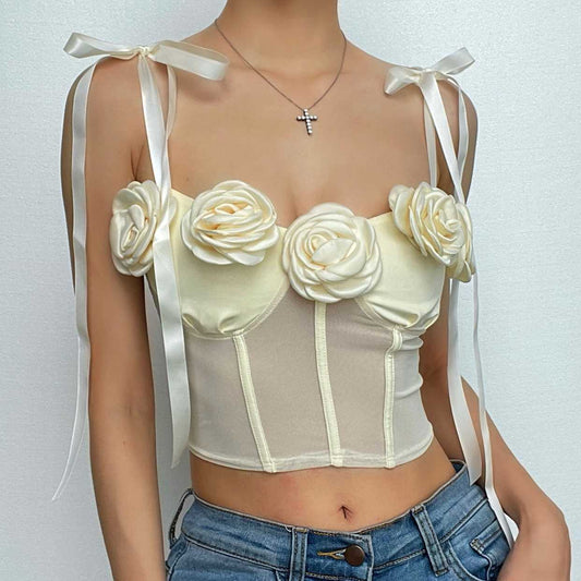 Top corto bustier con schiena scoperta e applicazione di fiori in rete 