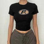 Top corto a maniche corte con scollo rotondo e ricamo "R" 